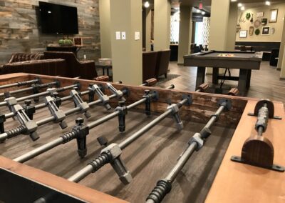 Nexus Luxury Apartments in Virginia Beach resident lounge with foosball and billiards